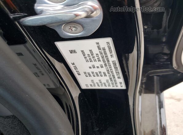 5YJ3E1EA9SF940615 2025 TESLA MODEL Black VIN კოდის სტიკერის ხედი