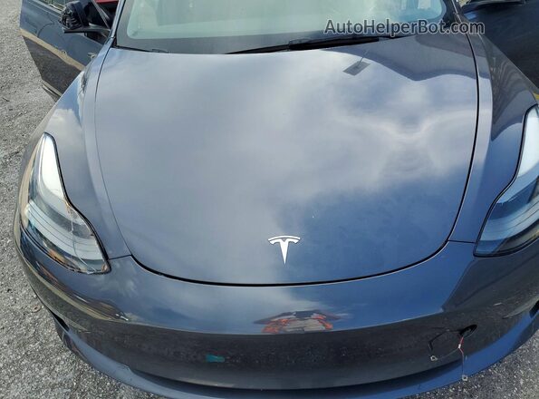 5YJ3E1EAXPF498757 2023 TESLA MODEL Gray Rear interior view