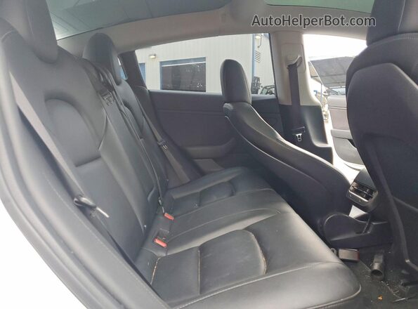 5YJ3E1EB0JF106594 2018 TESLA MODEL White Vista de los asientos traseros