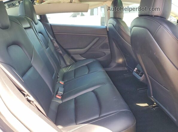 5YJ3E1EB0MF936657 2021 TESLA MODEL Gray Rear seats view