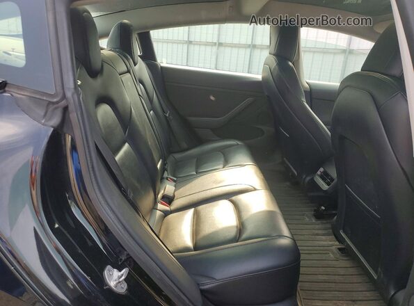 5YJ3E1EB0NF291056 2022 TESLA MODEL Black Widok tylnych siedzeń