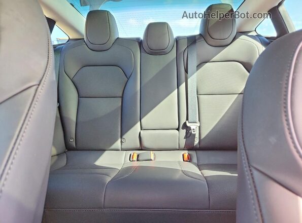 5YJ3E1EB0SF996757 2025 TESLA MODEL Silver Rear seats view