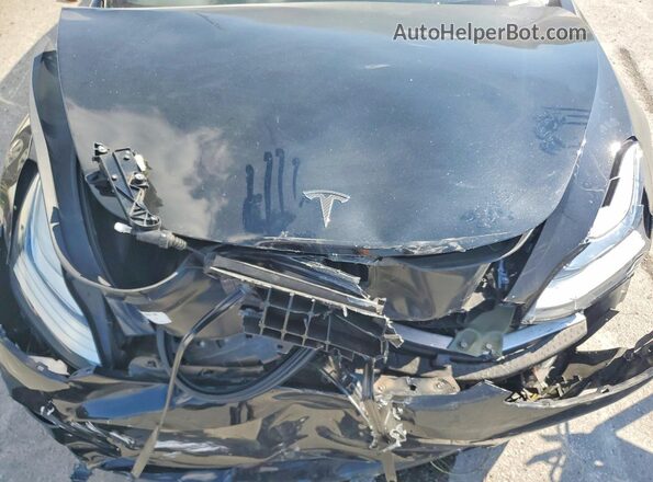 5YJ3E1EB1JF171082 2018 TESLA MODEL Black Vista interior trasera