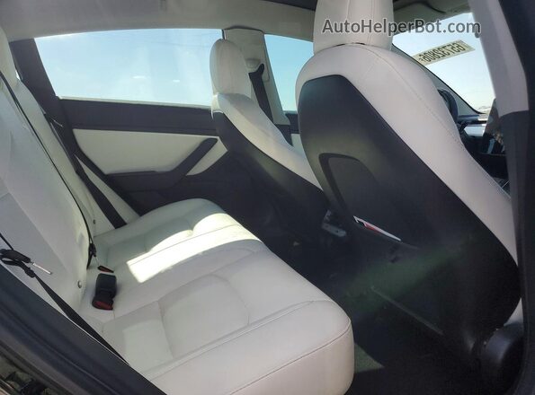 5YJ3E1EB1JF171082 2018 TESLA MODEL Black Vista de los asientos traseros