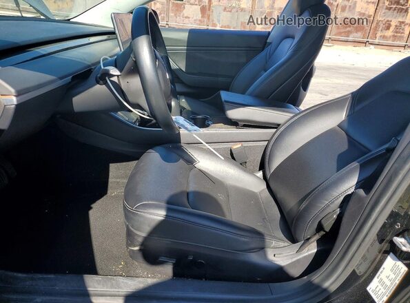 5YJ3E1EB1KF186747 2019 TESLA MODEL Black Front interior view