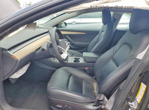 5YJ3E1EB1MF979484 2021 TESLA MODEL Black Front interior view