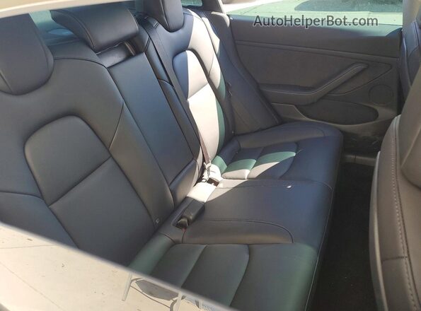 5YJ3E1EB1NF128559 2022 TESLA MODEL White Rear seats view