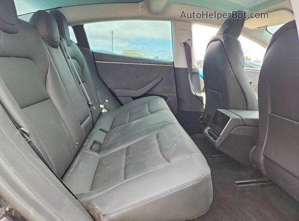 5YJ3E1EB1RF736989 2024 TESLA MODEL Charcoal უკანა სავარძლების ხედი
