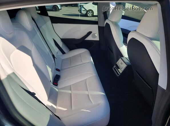 5YJ3E1EB1SF987811 2025 TESLA MODEL Угольный Вид задних сидений