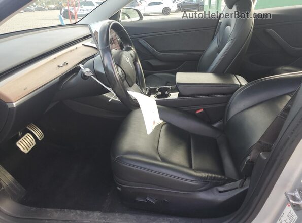 5YJ3E1EB2JF083335 2018 TESLA MODEL Silver Front interior view