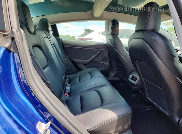 5YJ3E1EB2MF049593 2021 TESLA MODEL Blue Rear interior view