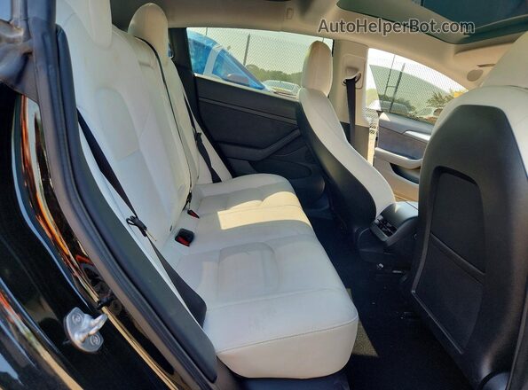 5YJ3E1EB2NF230453 2022 TESLA MODEL Black Widok tylnych siedzeń