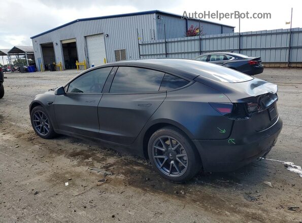 5YJ3E1EB2PF661944 2023 TESLA MODEL Black Trasero izquierdo