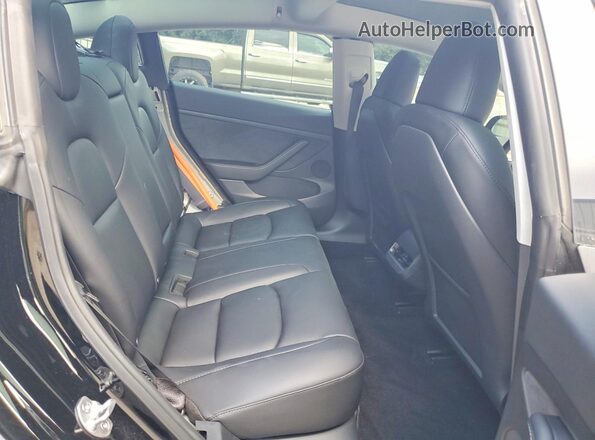 5YJ3E1EB2PF661944 2023 TESLA MODEL Black Vista de los asientos traseros