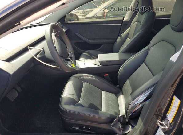 5YJ3E1EB2RF813529 2024 TESLA MODEL Black Front interior view