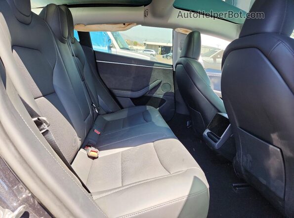5YJ3E1EB2RF813529 2024 TESLA MODEL Black Rear seats view