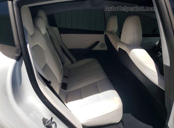 5YJ3E1EB2SF933773 2025 TESLA MODEL Белый Вид задних сидений