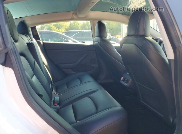 5YJ3E1EB3PF390022 2023 TESLA MODEL White Rear seats view