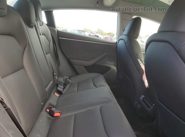 5YJ3E1EB3SF011044 2025 TESLA MODEL Черный Вид задних сидений