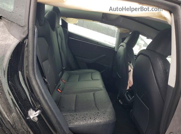 5YJ3E1EB3SF882252 2025 TESLA MODEL Black უკანა სავარძლების ხედი