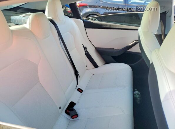 5YJ3E1EB3SF900782 2025 TESLA MODEL Black Вид задніх сидінь