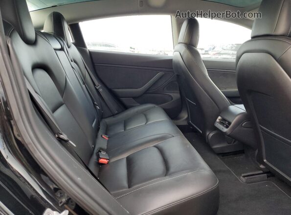 5YJ3E1EB4JF127481 2018 TESLA MODEL Black Rear seats view