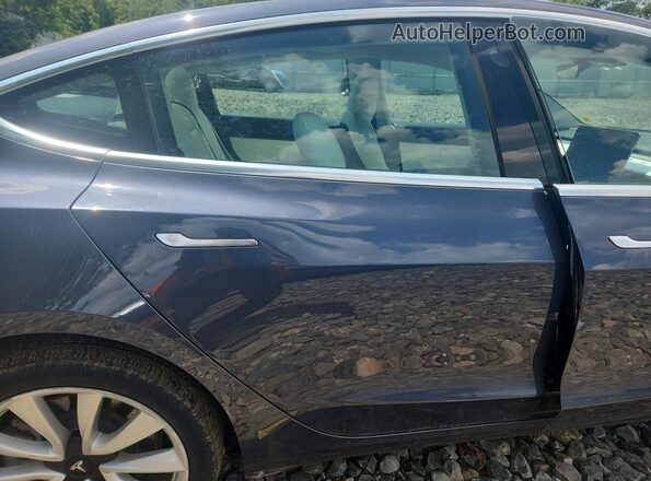 5YJ3E1EB5LF791467 2020 TESLA MODEL Gray Rear seats view