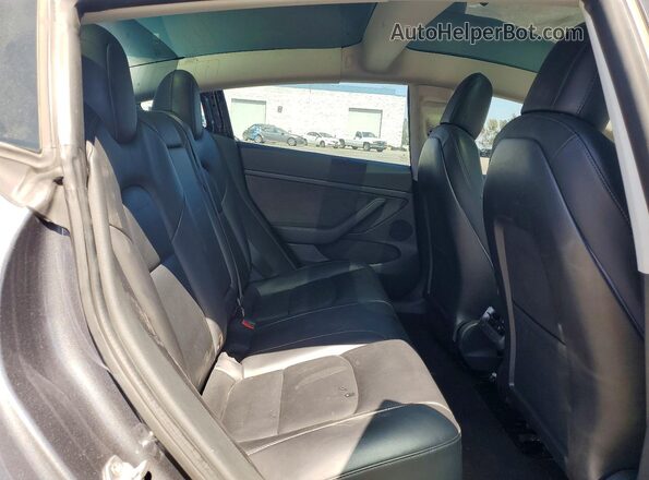 5YJ3E1EB5MF150319 2021 TESLA MODEL Gray Widok tylnych siedzeń