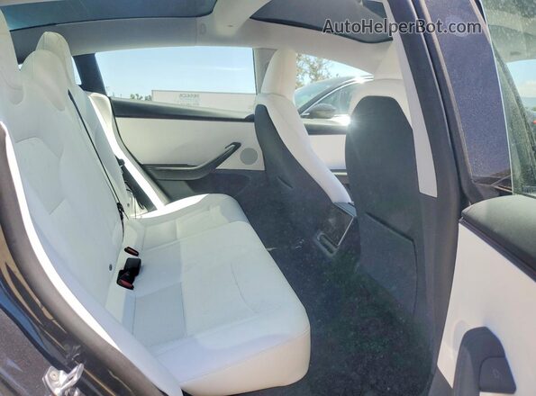 5YJ3E1EB5TF159732 2026 TESLA MODEL Charcoal Vista de los asientos traseros