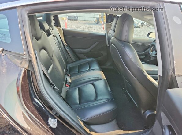 5YJ3E1EB6JF071804 2018 TESLA MODEL Black Rear seats view