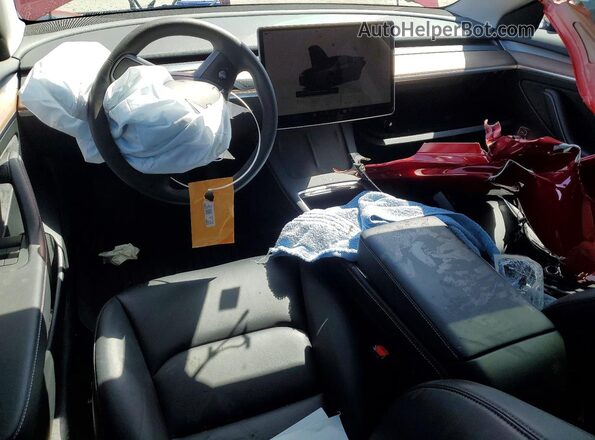 5YJ3E1EB6PF603965 2023 TESLA MODEL Красный Вид панели приборов