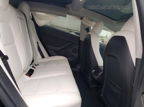 5YJ3E1EB7MF060444 2021 TESLA MODEL Black Rear seats view