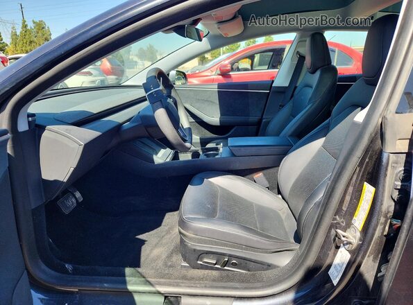 5YJ3E1EB7RF744692 2024 TESLA MODEL Серый Вид салона спереди