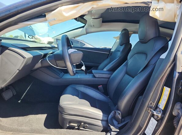 5YJ3E1EB8RF732633 2024 TESLA MODEL Charcoal Front interior view
