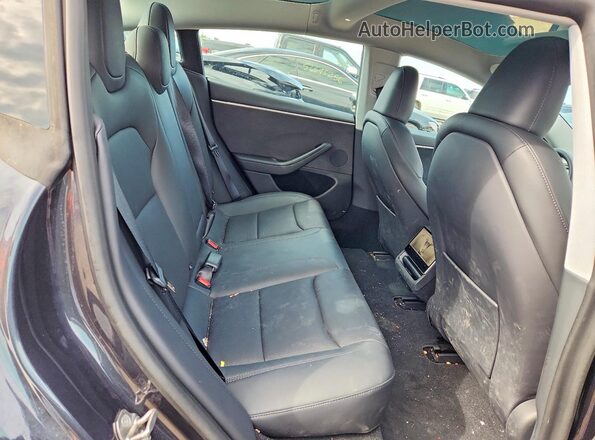 5YJ3E1EB8RF819559 2024 TESLA MODEL Black Rear seats view