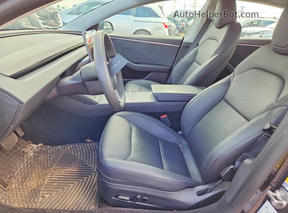 5YJ3E1EB8RF819559 2024 TESLA MODEL Black Front interior view