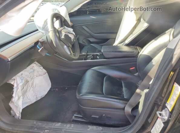5YJ3E1EB9JF071912 2018 TESLA MODEL Black Front interior view