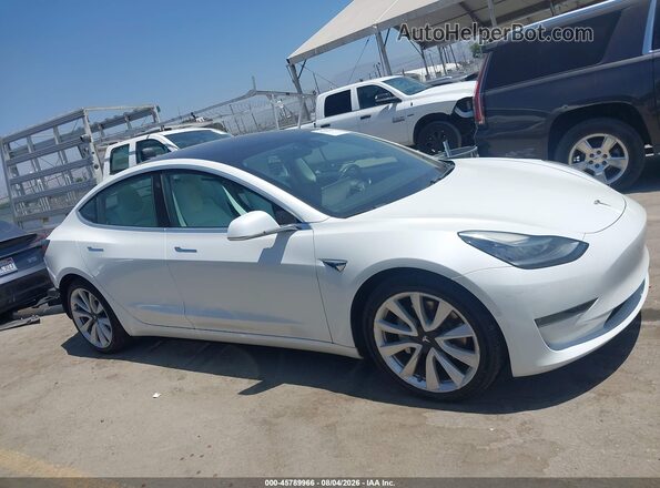 5YJ3E1EB9KF407009 2019 TESLA MODEL 3 White Widok wnętrza z tyłu