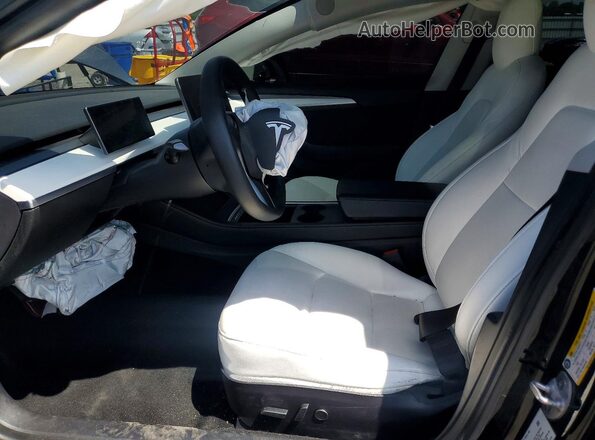 5YJ3E1EB9MF046352 2021 TESLA MODEL Black Vista interior delantera