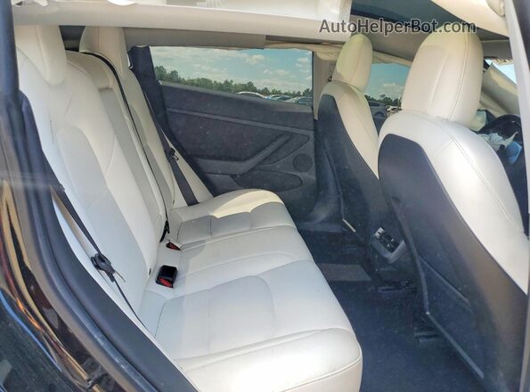 5YJ3E1EB9MF046352 2021 TESLA MODEL Black Vista de los asientos traseros