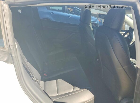 5YJ3E1EB9NF204027 2022 TESLA MODEL White Vista de los asientos traseros