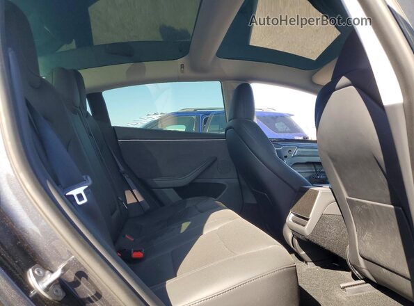 5YJ3E1EB9SF907607 2025 TESLA MODEL Gray Հետևի նստատեղերի տեսք