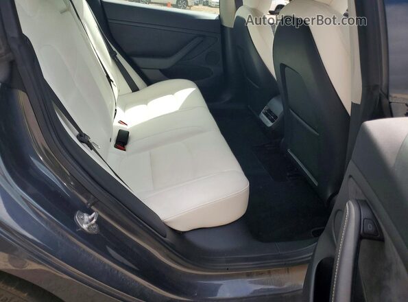 5YJ3E1EBXNF198139 2022 TESLA MODEL Gray Vista de los asientos traseros