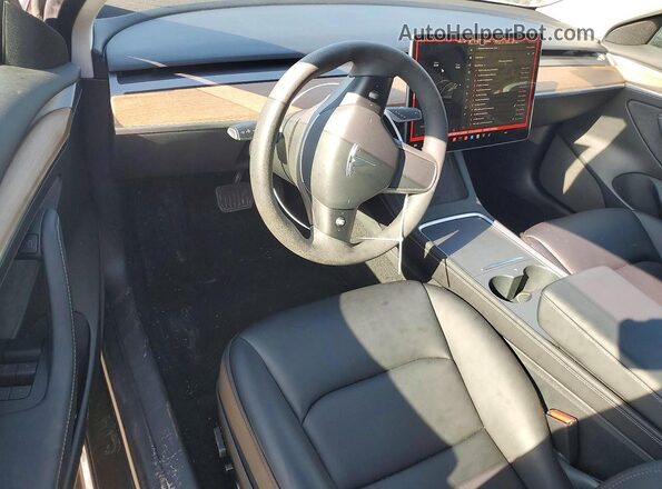 5YJ3E1EBXNF323818 2022 TESLA MODEL Черный Вид панели приборов