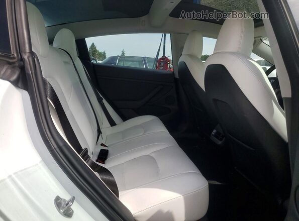 5YJ3E1EC8PF560920 2023 TESLA MODEL White Vista de los asientos traseros