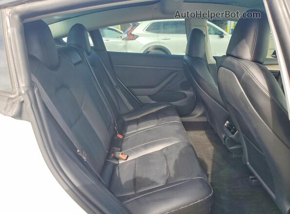 5YJ3E1ECXPF668889 2023 TESLA MODEL White Հետևի նստատեղերի տեսք
