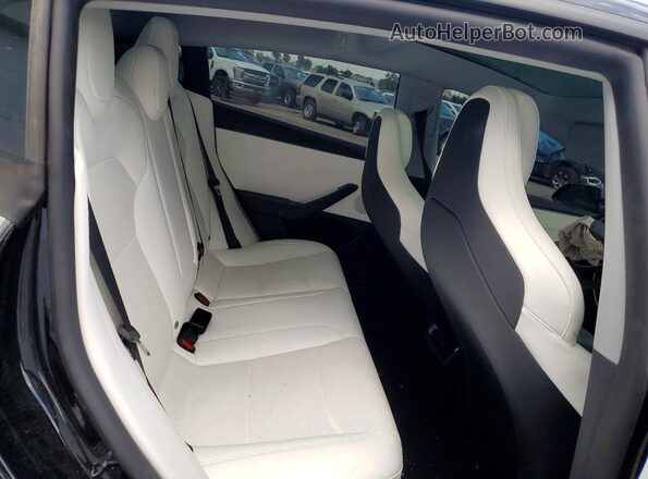 5YJ3E1ET5TF193789 2026 TESLA MODEL Black უკანა სავარძლების ხედი