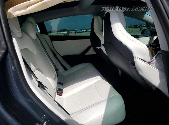 5YJ3E1ET6RF858286 2024 TESLA MODEL Black Հետևի նստատեղերի տեսք