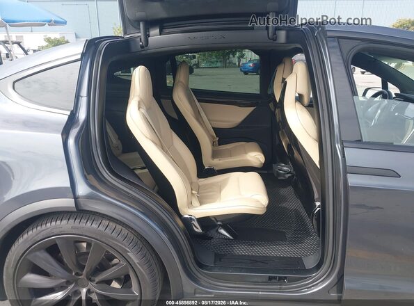 5YJXCBE22GF016482 2016 TESLA MODEL X Black VIN կոդի պիտակի տեսք