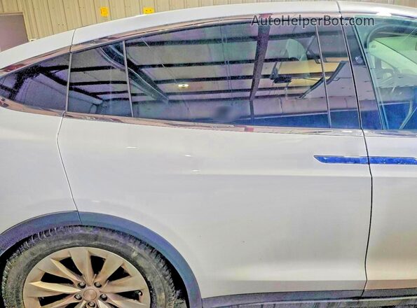 5YJXCDE29HF043692 2017 TESLA MODEL White Rear seats view